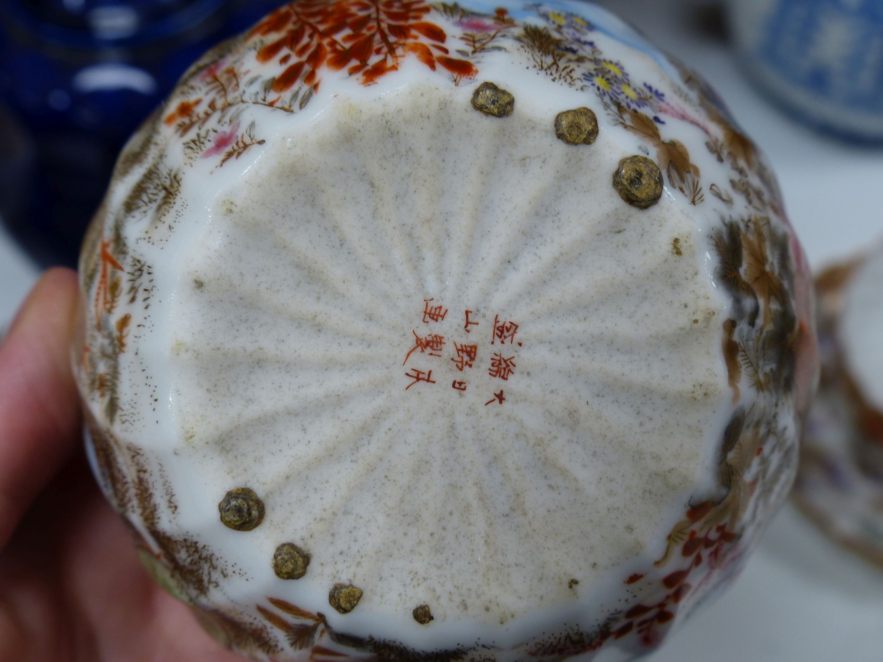 A Japanese blue and white tea kettle, Satsuma and Kutani wares etc